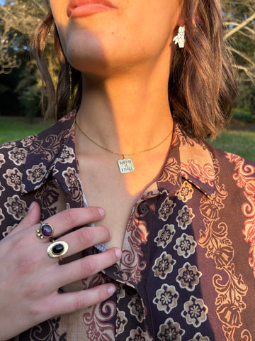 Collana targhetta “Amerai il finale”