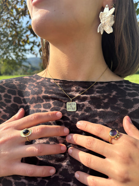 Collana targhetta “Amerai il finale”